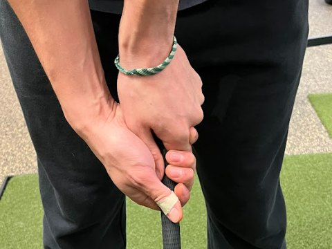 Hands on the grip